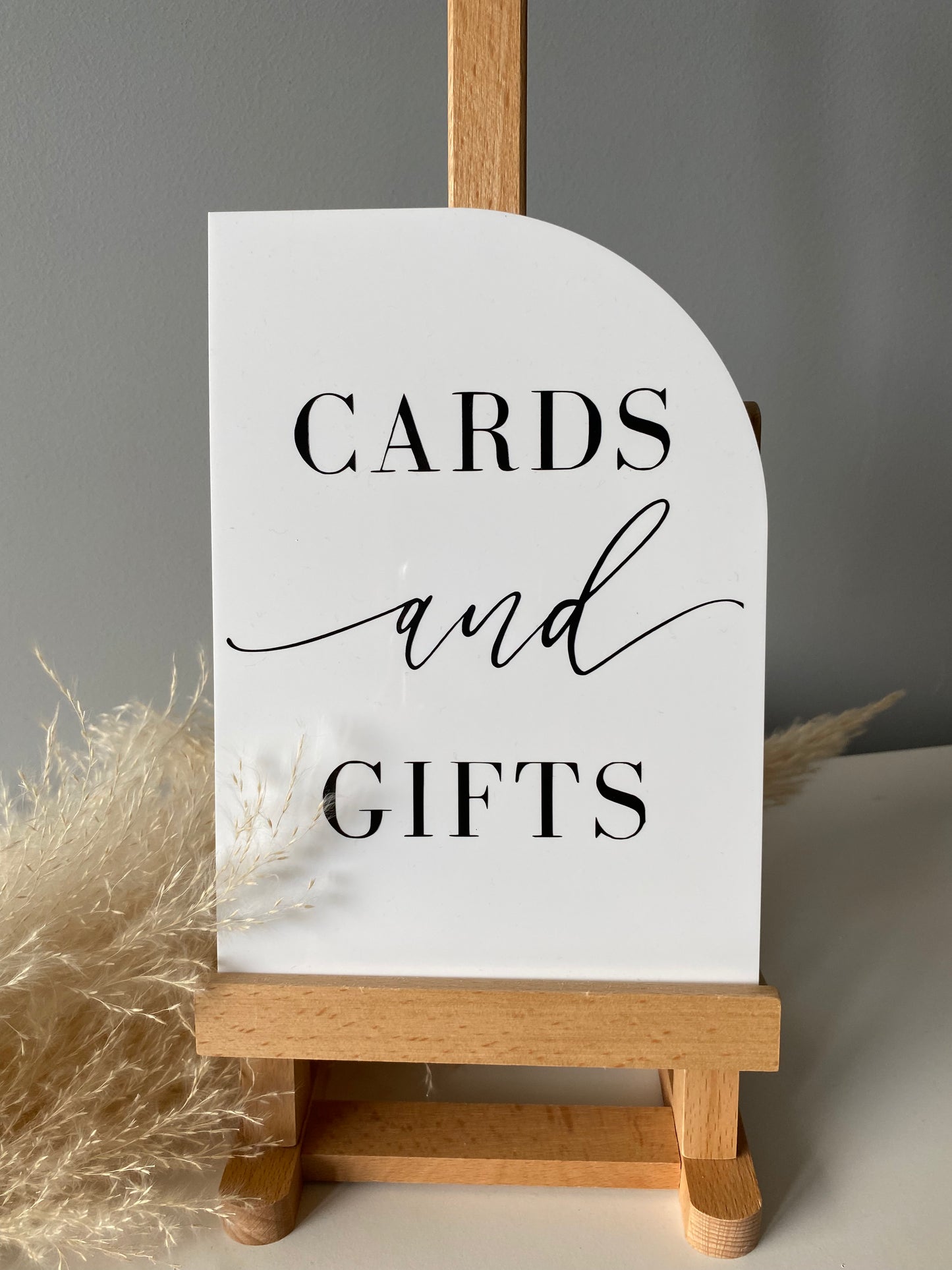 White Semi Arched Signage
